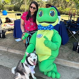 Law frog with dog and owner