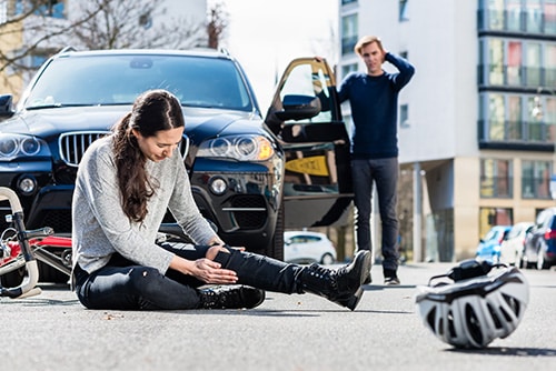 Woman injured on bicycle accident hit by car